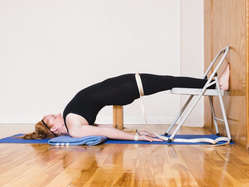 Yoga instructor Donna Read in a Supported Setu Bandha Sarvangasana (Supported Bridge Pose) - (Variation 3, United Yoga Montreal) | Subtle